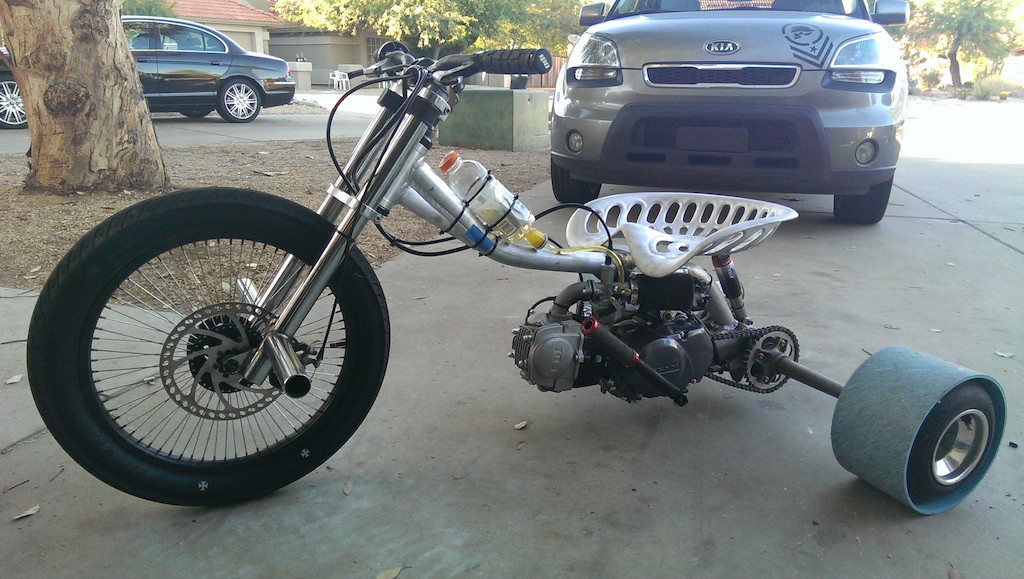 Still making the gas tank but had to share. 80cc 4 stroke, honda 450 quad rear end, shifter cart tires, 8 inch rotors with juicy front brake. Handmade Amish seat.