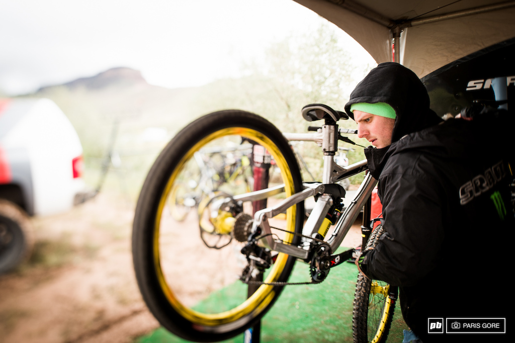 Evan Warner giving Cam Zink s Hyper a spruce tune.