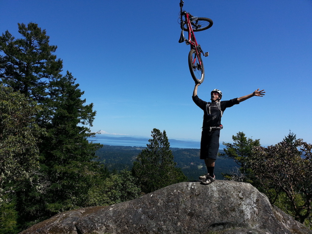 buddy Jason took this pic on me holding my bike at the top of the climb . I used a piece of Velcro to hold my wheel from moving around !!