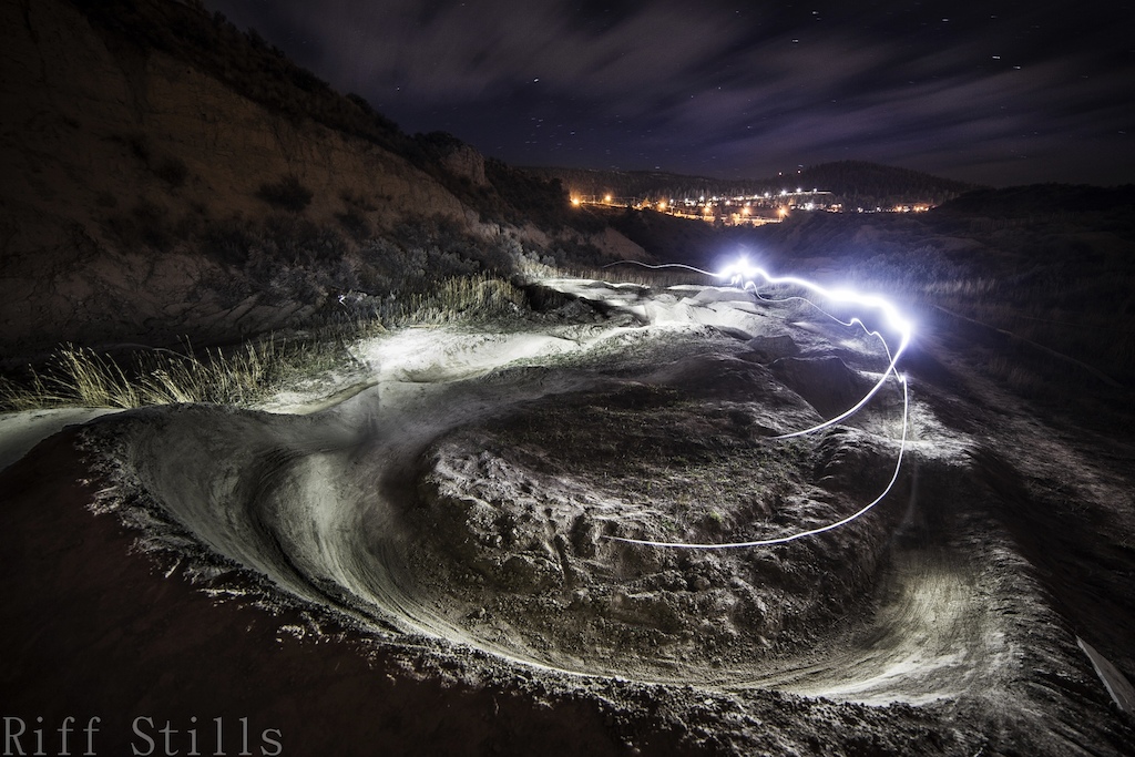 A pump track lap. Head and bar lights