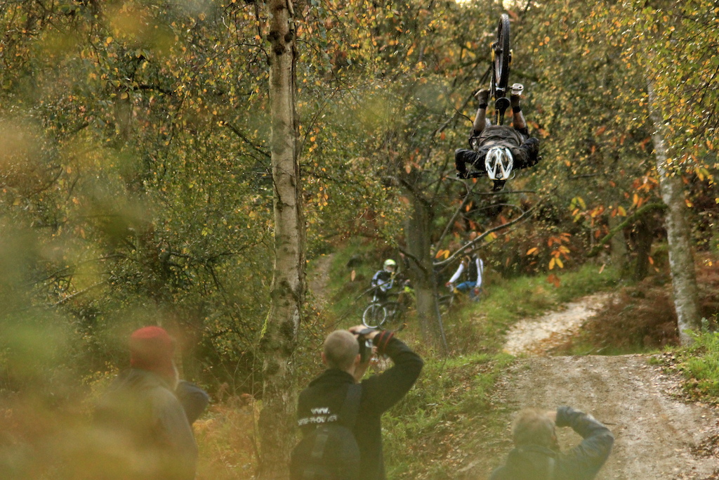 A really quite impressive backflip on a Saracen Myst, Grant Martin riding it out third time lucky.