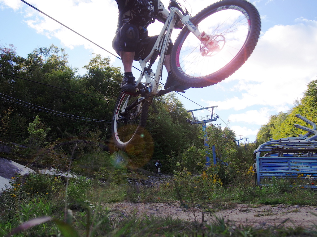 Catching some air at "Le chanteclerc" trail network