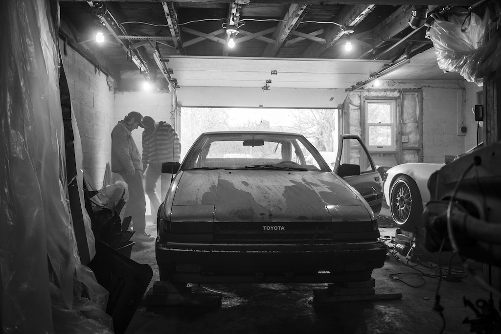 ae86 at the new garage, stripping it down and painting it