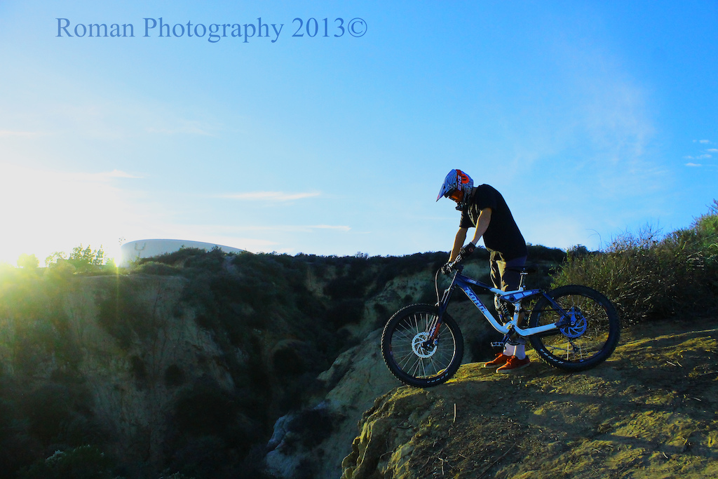 Checking out a big drop, about 12 ft down, 20 ft out.