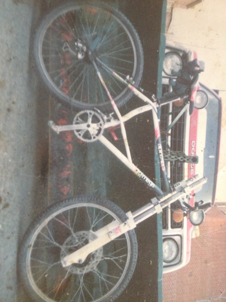 Crazy project when i was 17 (im 33 now)

i fitted a MX front fork (which was way tooo heavy for my lil frame  ( see the other picture in my album))

im a machinist so  i made a custom steering shaft with 2inch by 2 inch by 6 inch long stem and MX steering bar (36inch wide !!!) and   2   1.5 inch thick crown all from 6061 T6

notice the MX front hub is way to big so i had to twists spoke to shorten them to fit in that crazyness

after 2 year of riding it  the frame snapped in 3 piece rolf ( see other pics)