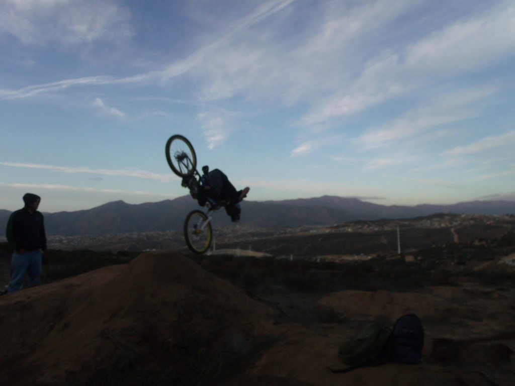 landing a backflip on a dh bike (09' Giant Glory w/ boxxer wc fork &amp; fox dhx 5.0 coil shock)
nailed it 4 times with a smooth landing this time.