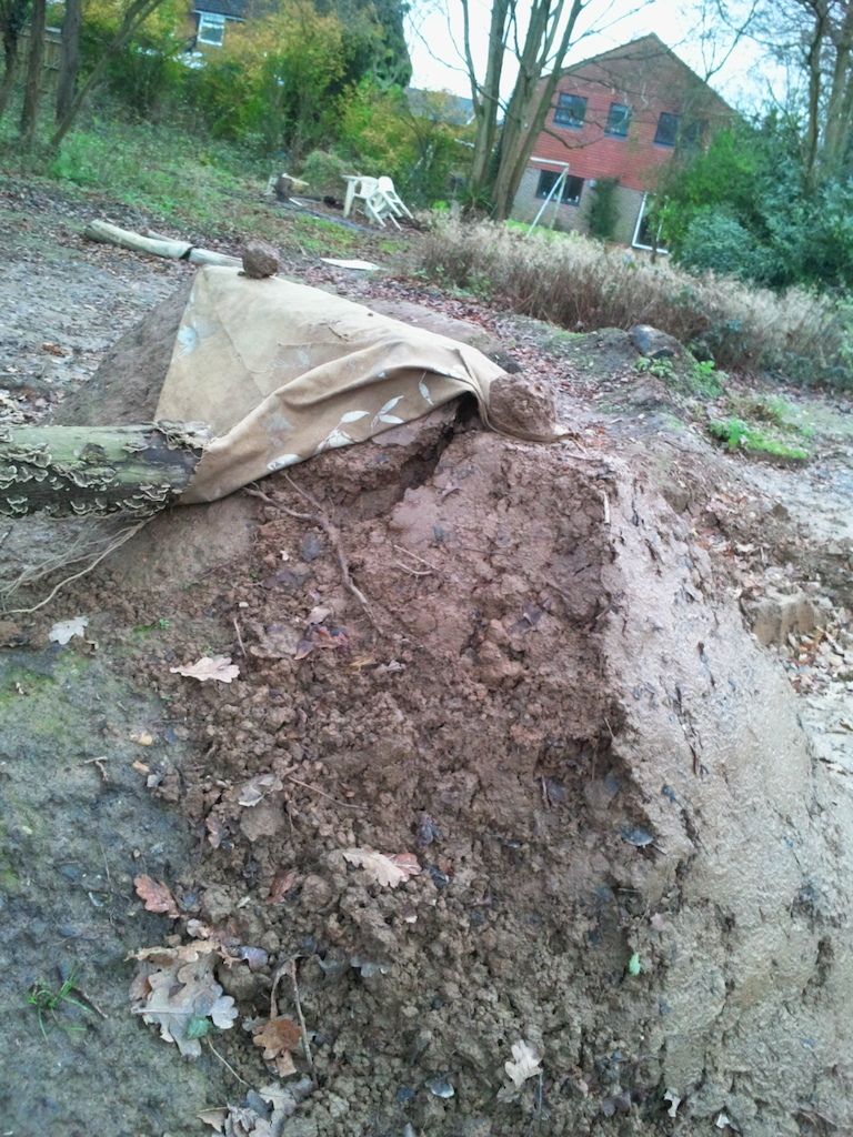 the weather recently has destroyed the 1st dirt jump, spliting a quater of it off because of the rain.