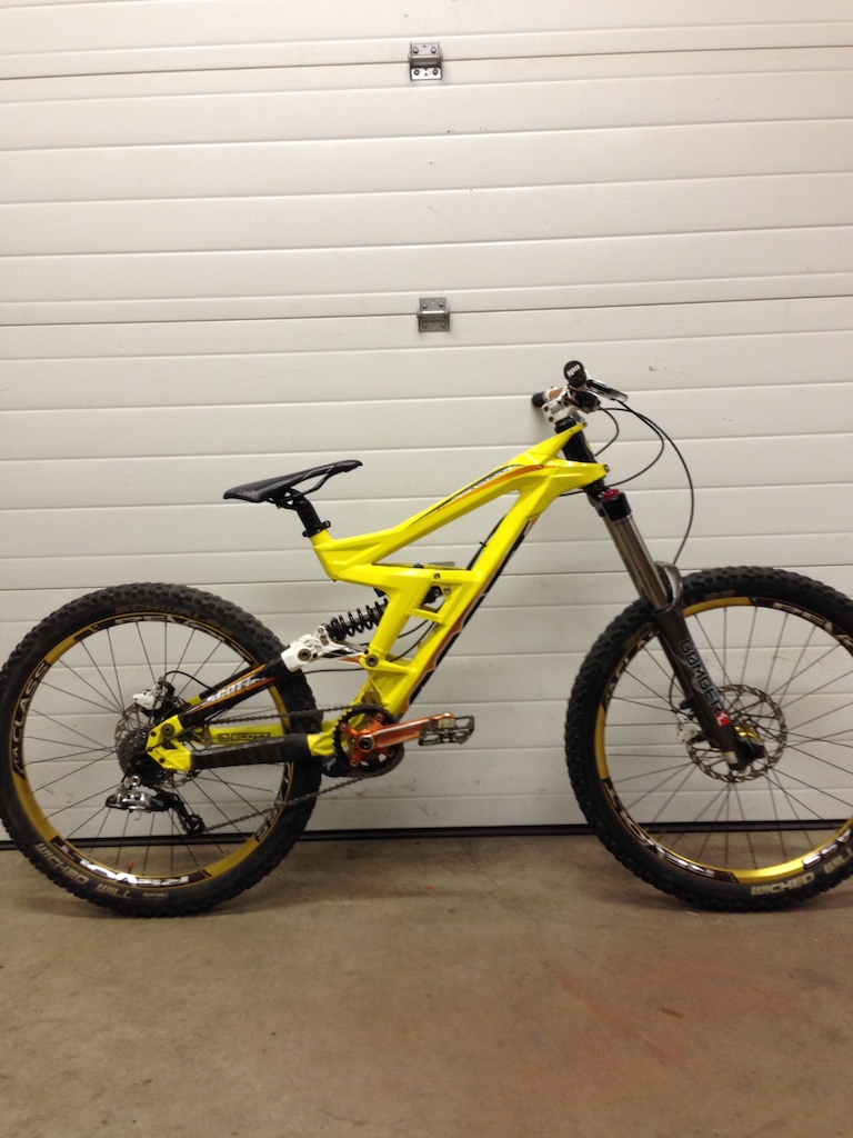 Frame - Size short 2010 Scott Gambler 10 (adjustable travel - 7.5", 8.5", or 9.5". Currently set at 8.5")
Fork - Marzocchi 66 RC3 Ti has air prload, coil preload, hi/lo compression, rebound. (nickel coated stantions)
Shock - Fox RC4
Wheels - A Class Revolt wheelset.
Shifter/Derailleur - Sram X9 9 speed
Brakes - Avid Elixer 5's
Bar - Raceface Atlas
Stem - Raceface Respond
Chainguide - MRP G2
Cranks - Raceface Atlas
Pedals - Funn
Seat - Selle Italia 
Tires - Schwalbe Wicked Will