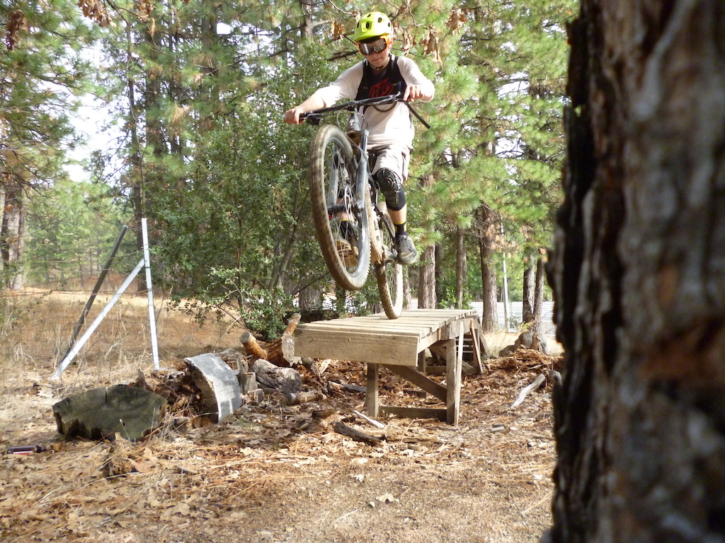 2014 Specialized Enduro 29 Expert Carbon demo bike over a teeter-totter