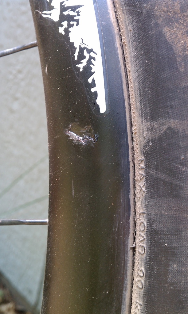 After overshooting a landing bigtime, which ended in an OTB, I noticed that somehow I damaged my front Enve rim.