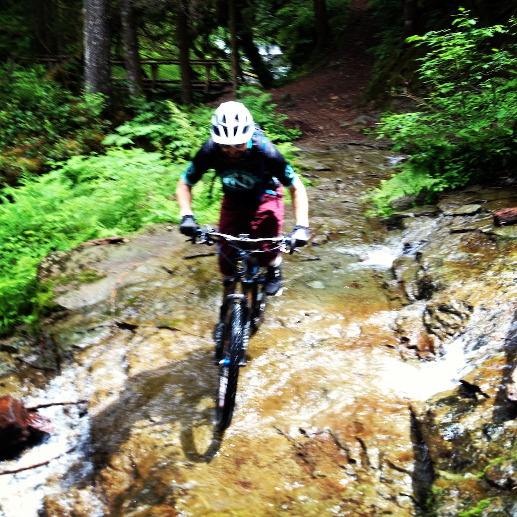 Riding over the top of the Siouxon Creek Falls