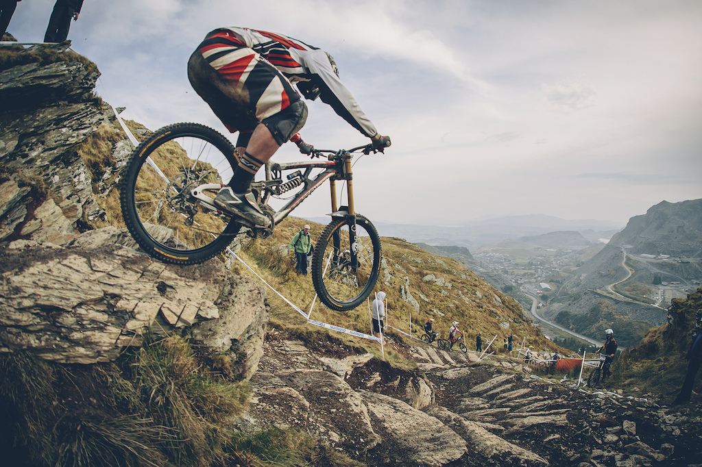 Sam Dale dropping in off the techy rock at the first round of the Shimano British Downhill Series 2014 at Antur Stiniog, North Wales - Photo: Laurence Crossman-Emms