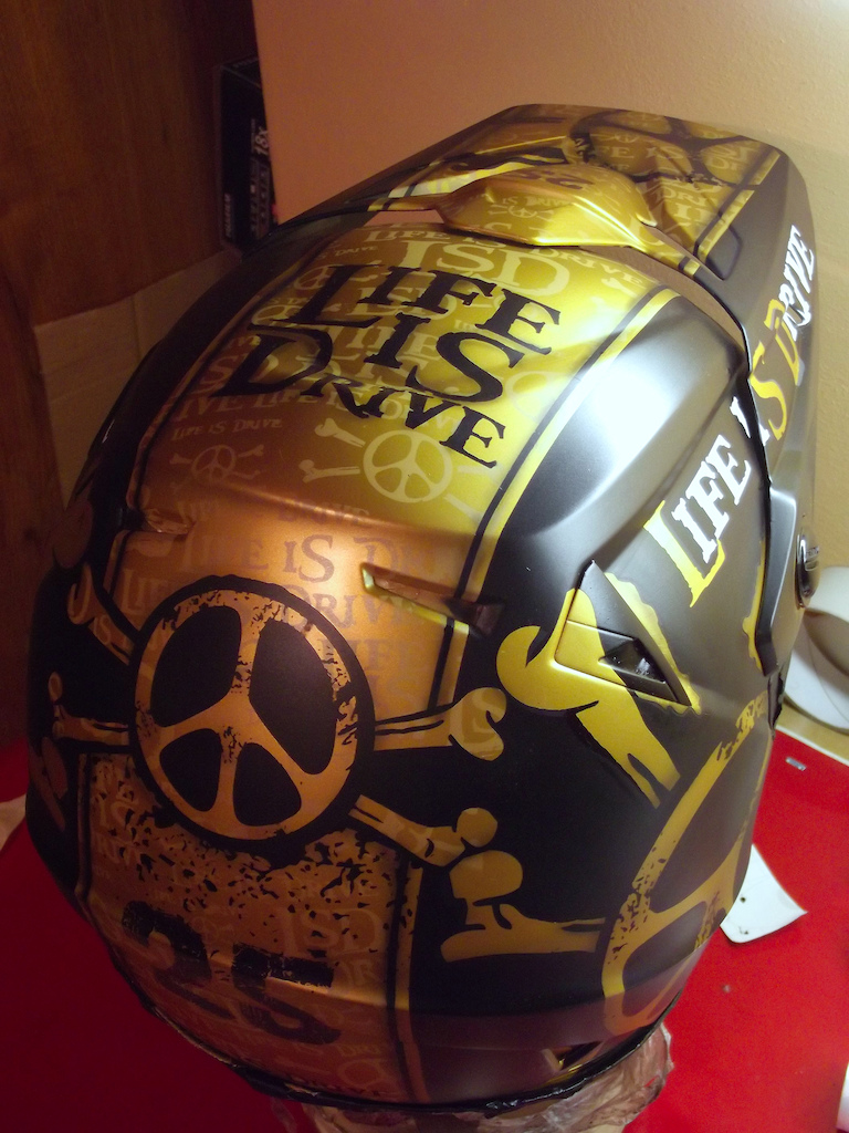 Custom painted LSD helmet, just before the clearcoating. Masking that little logos was real hell.