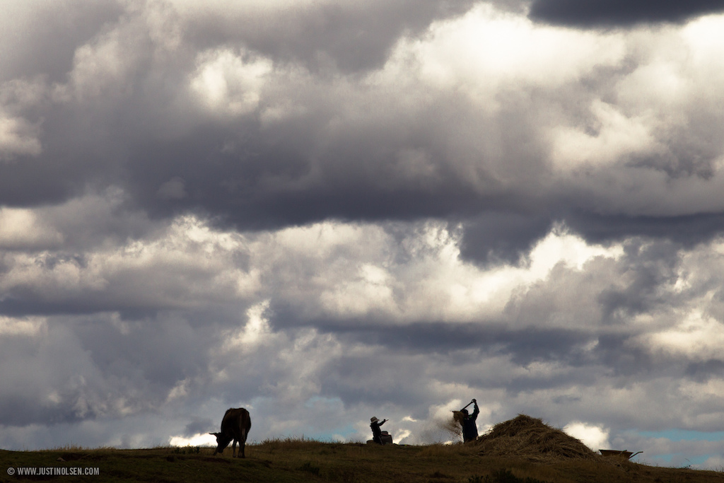 Peruvian farmer and clouds