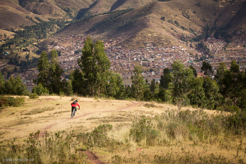 There a endless stretches of single track in the mountains surrounding Cusco just like this one. Garret Buehler cranking through it.