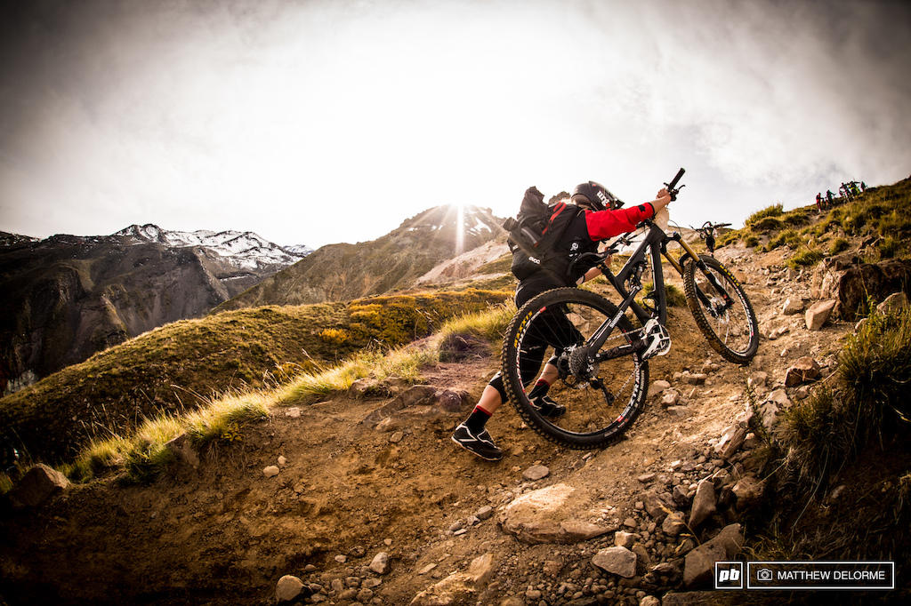 The upper part of the transfer to Stage 4 is unrideable at least if you want to do well on the downhill. It is brutally steep. Best to push up and save energy for the stage.