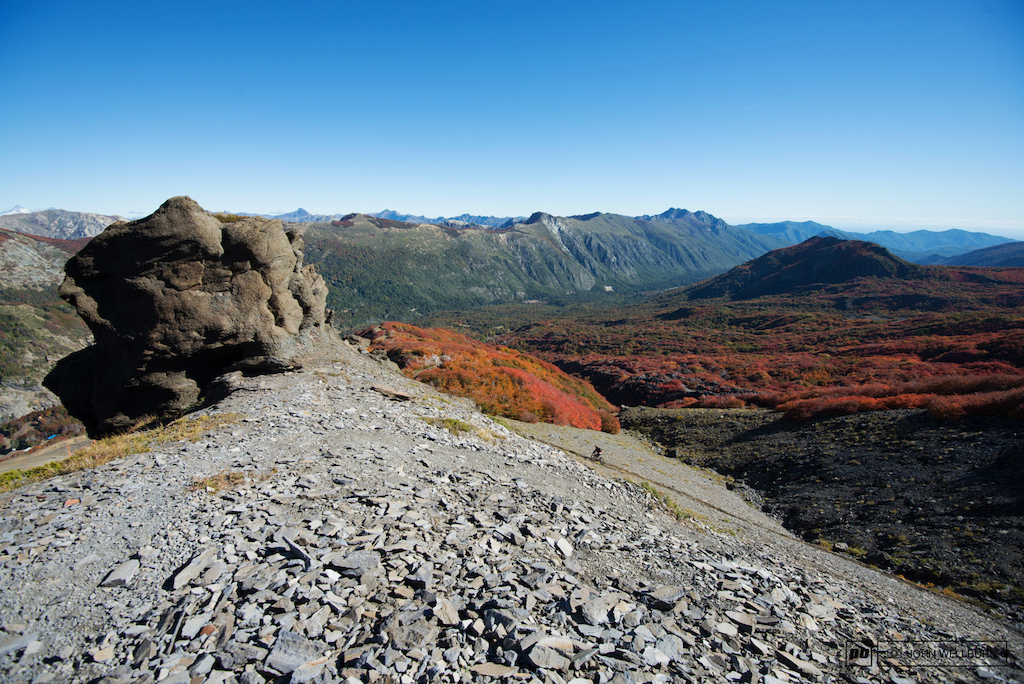 Spot the rider in this huge landscape perfect single track transitions the rocky alpine to the forest below.