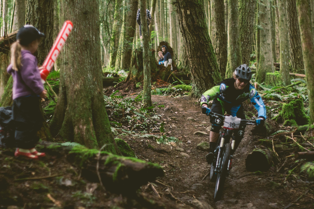 Sea to Sky Enduro Series Round 1 - Squamish, The Gryphon - Nick Geddes ripping Angry Midget a new one while a small fan watches.