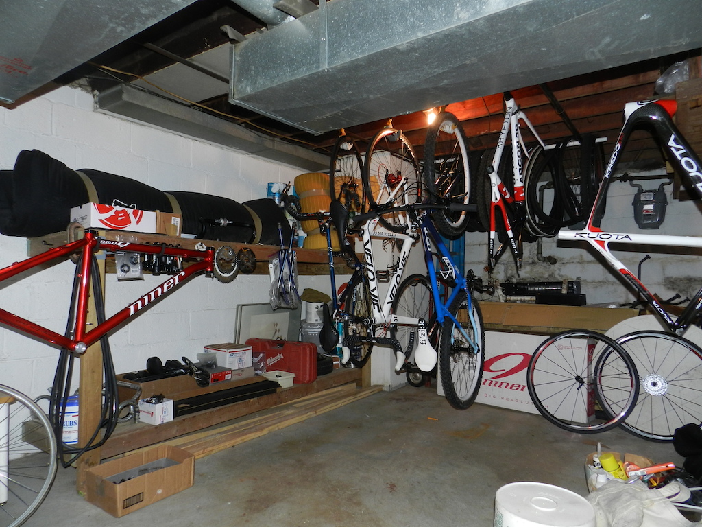 The basement at one point. It changed often, I've got an obsessive side. One of the two GT Peace SS's I've owned is pictured. They were great cheap winter bikes. The Kuota isn't mine, it was a cracked frame that I was given by my buddy at the LBS. I'll never own a Kuota, if I'm given one for free I'll sell it to anyone who will pay for it.