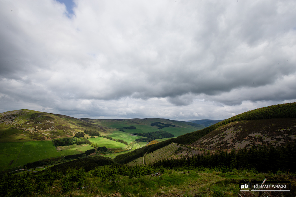 That faint yellow line on the hillside to the right is the transfer for the Innerleithen stages on day one.