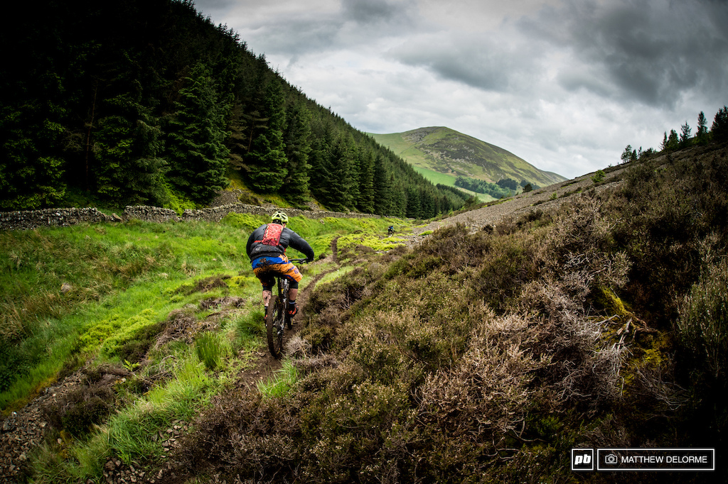 Day one kicks off on the network of trails the locals refer to as Golfy. The liaisons here are long dirt road climbs that run up to the top of Kirnie Law. Stages 1 and 2 then run through open heather fields before plunging into steep tight single track riddled with slick roots. Stay on with as little dabbing as possible and you ll be in good shape.