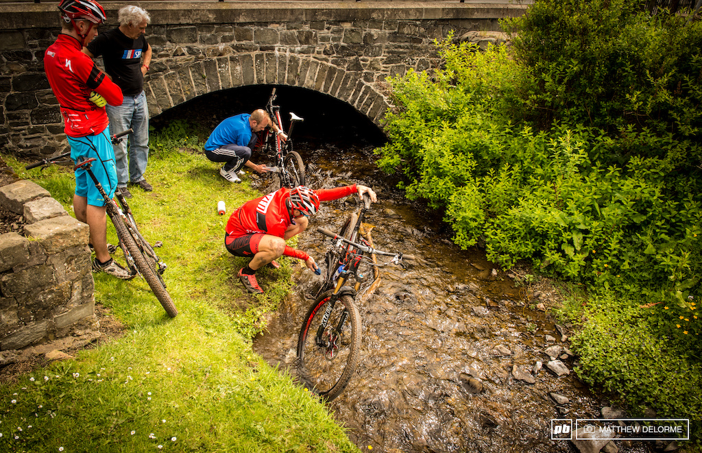 The traditional Scottish bike wash. Get em clean in the local stream.