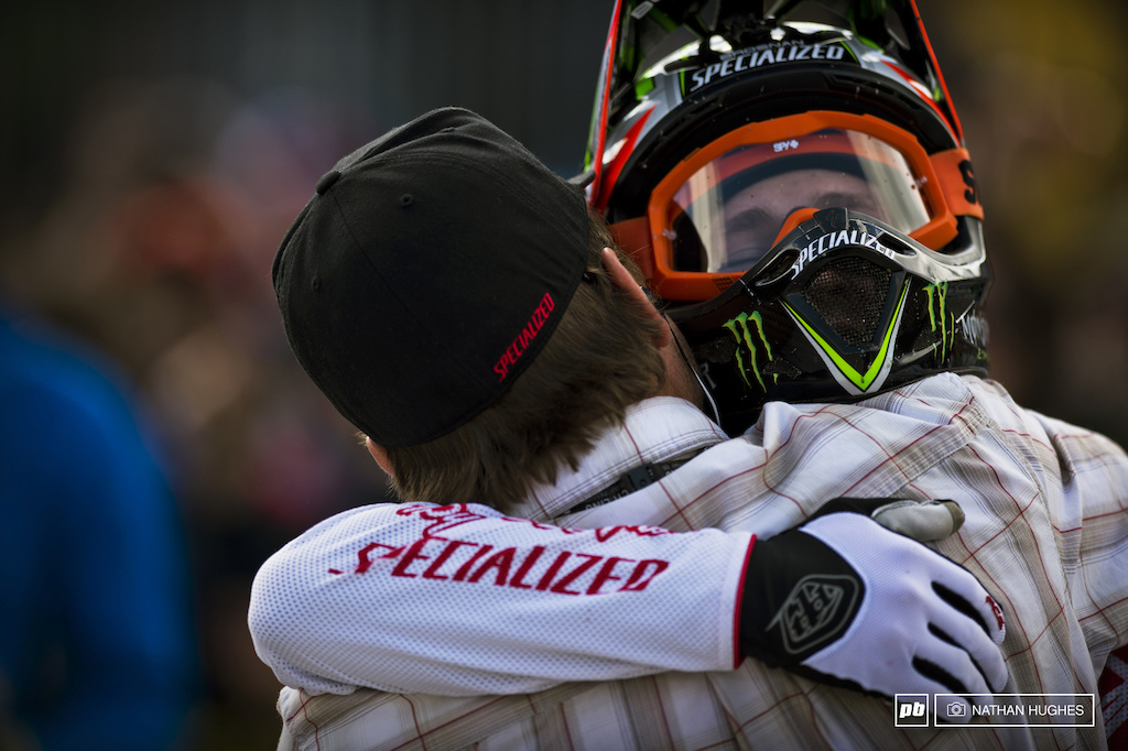 When is it cool for guys to hug in action sports? We just checked bro-code guidelines and it is fully legit when you win your first World Cup at the most notorious DH track on the circuit. EC and Troy bear-hug it, mid arena.
