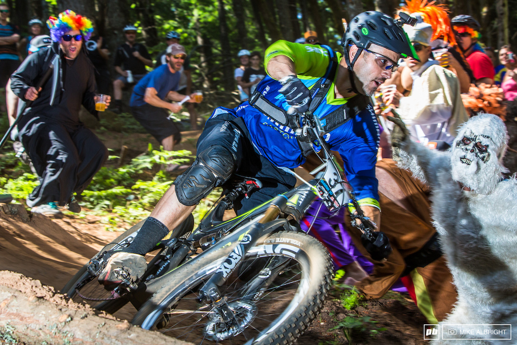 Joe Lawwill in heckler s row where riders had to run a gauntlet of costumed revelers in a series of s-turns.