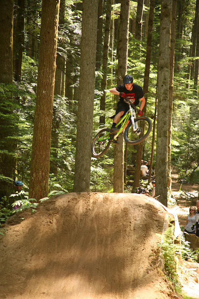 Another rider goes big at the Evergreen Mountain Bike Festival held June 7th, 2014. Photo by Thomas Dunkerley