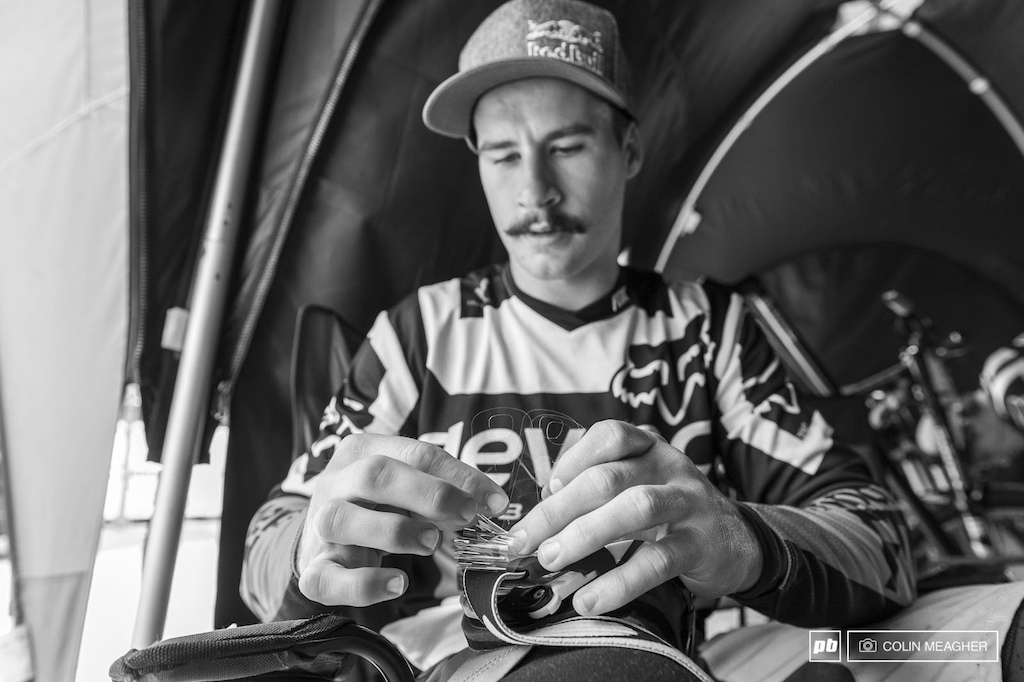 With rain in the forecast, Chainsaw took a few minutes during lunch to load up a few tear-offs onto his goggles... "Rain isn't forecast until this afternoon, but I'd rather not be out on a practice run without them." -Steve Smith.
