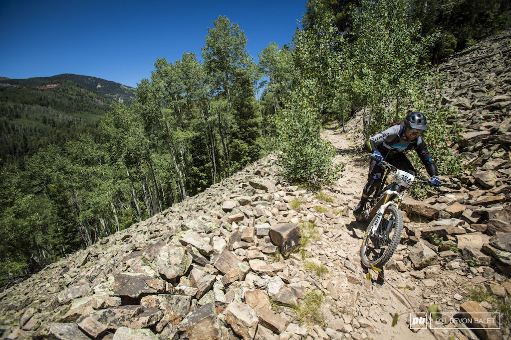 George Rogers of Salt Lake City smashes through yet another scree field on the first day of racing.