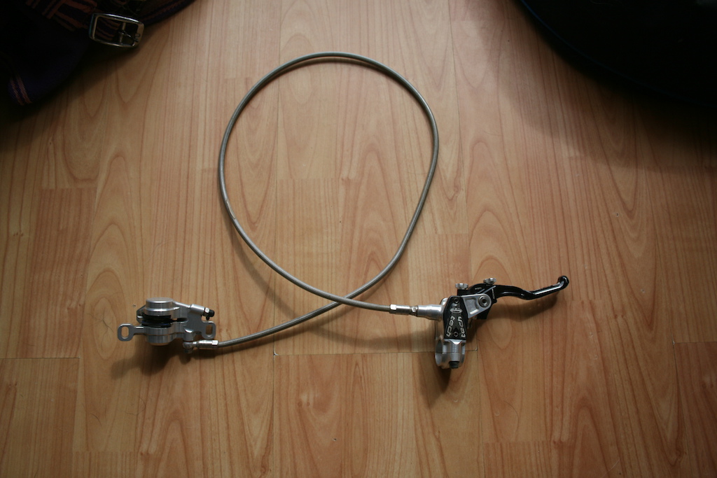 2012 Hope Tech X2 brakeset with braided hoses
