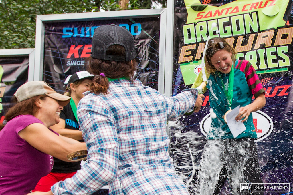 Kim Becker gets doused by friends after taking the Pro Women victory.