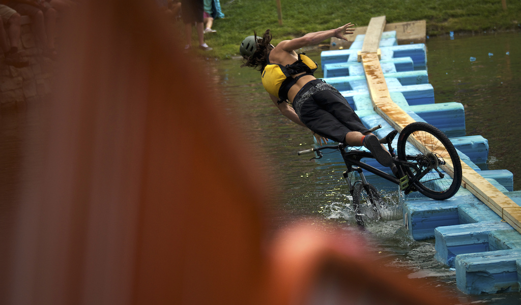 The pond crossing is made up of large floating pieces of foam that have skinny boards on the top. The riders have to "simply" make it across the pond, fastest time wins. Only four riders made it across this year and all used the slow and steady technique, the others, well, were not quite as lucky.