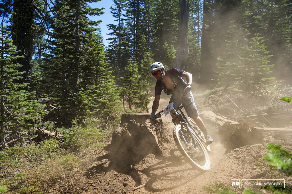EWS Managing Director Chris Ball digging deep to power through the dust on the Sunrise trail.