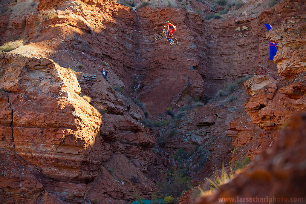 Shooting Brendog's self built canyon gap in first light was one of the nicest things to do at last year's Rampage... the sun was up just enough to illuminate him in front of the big dark cliffs in the background.