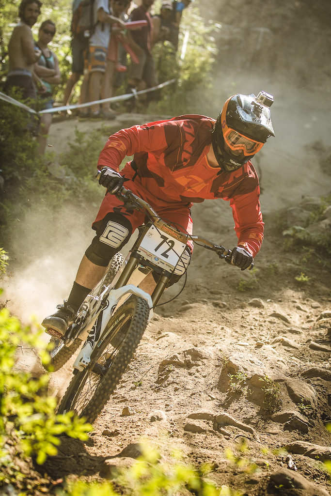 Zwar grins ear to ear as he emerges from the dust on Hecklers Rock unscathed during the Crankwork 2014 Canadian Open DH.