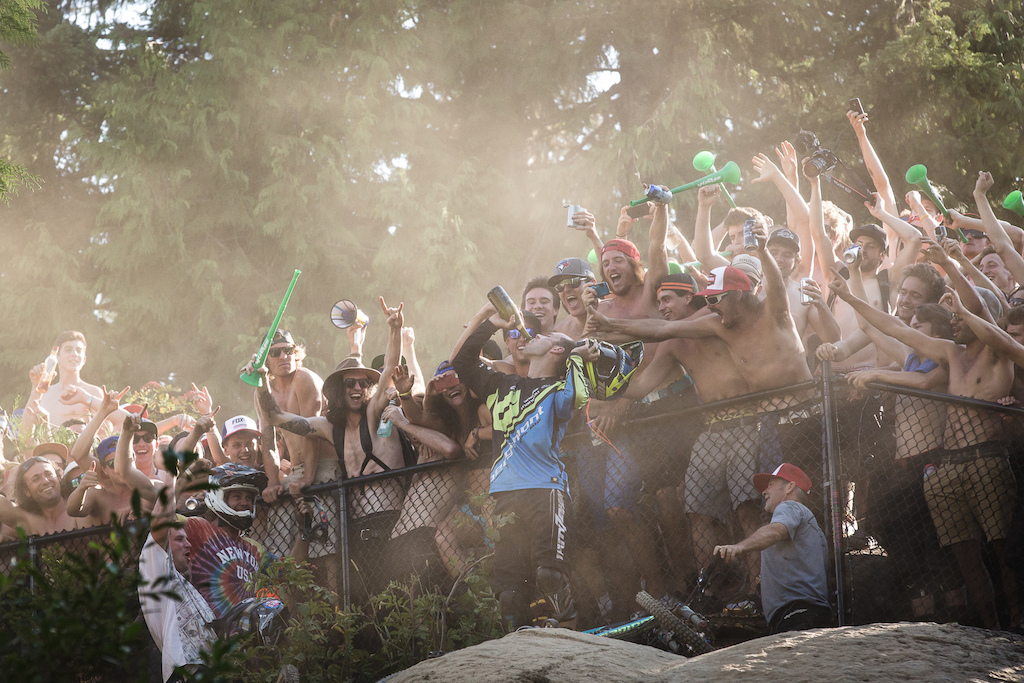 Eddie Masters pauses his run for a quick drink.  Canadian Open DH Crankworx 2014.