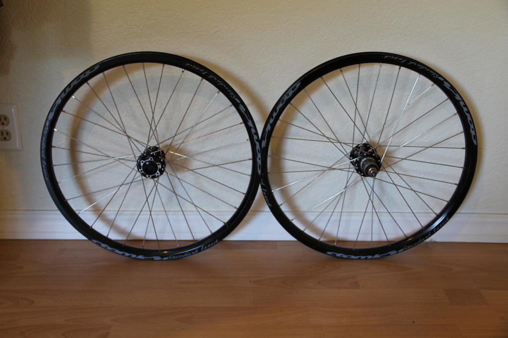 Atomlabs laced to transtion hubs, 24 inch wheels