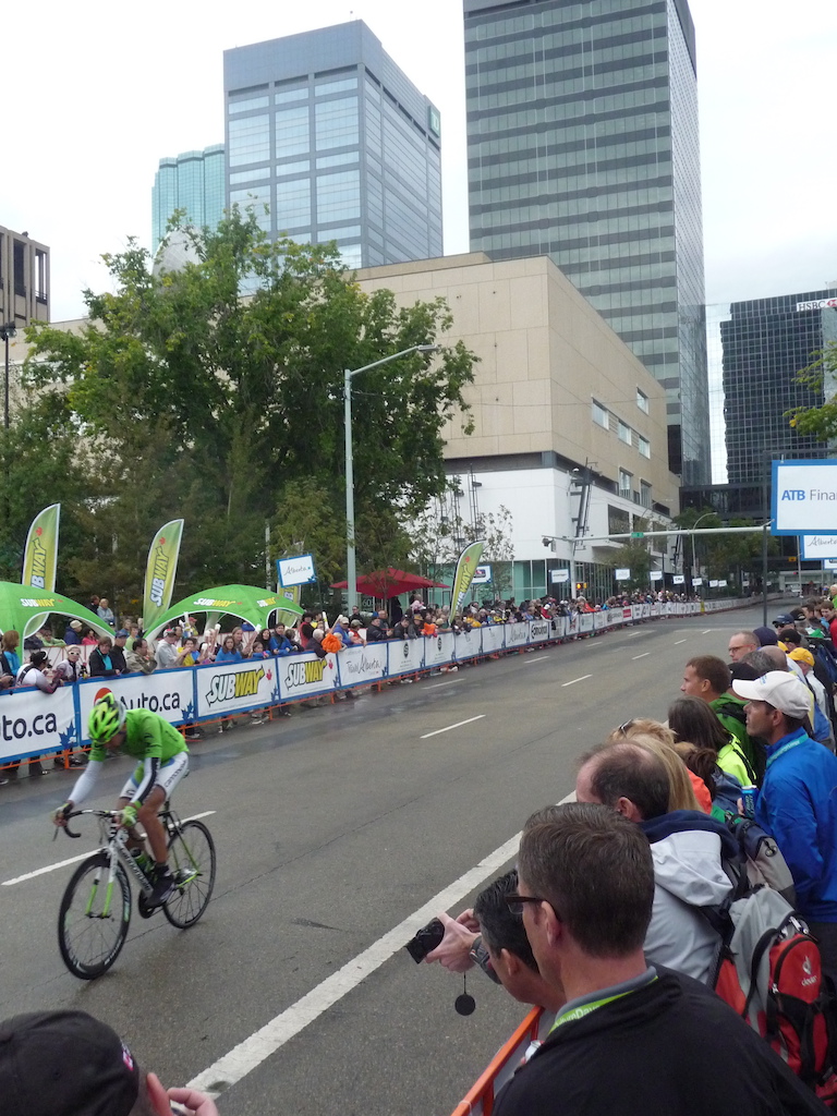 Fans of all ages cheer on a Pro rider at the 2014 Tour of Alberta.