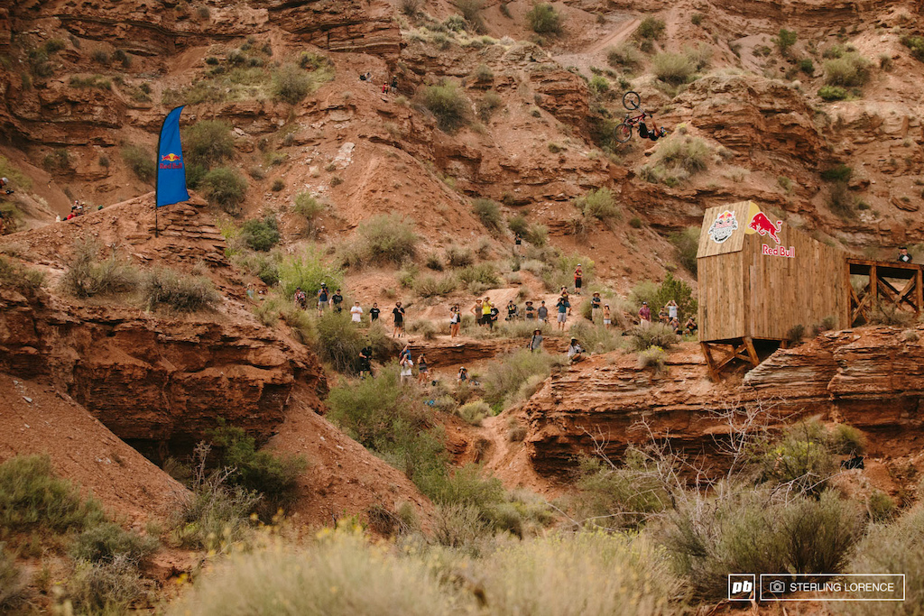 Szymon Godziek backflips the 70 foot canyon at RedBull Rampage 2014.