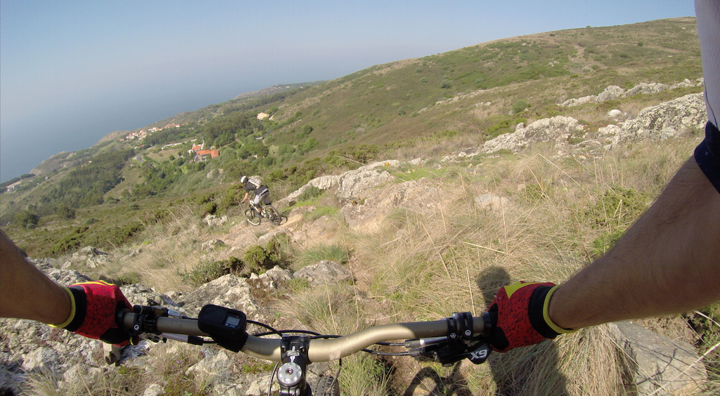This is in Sintra in the "Trilho dos Burros". It starts in the "Convento da Peninha" and it ends in the beach "Praia do Abano". 2014-09-25 Portugal. @rikardovalente in the handlebar.
