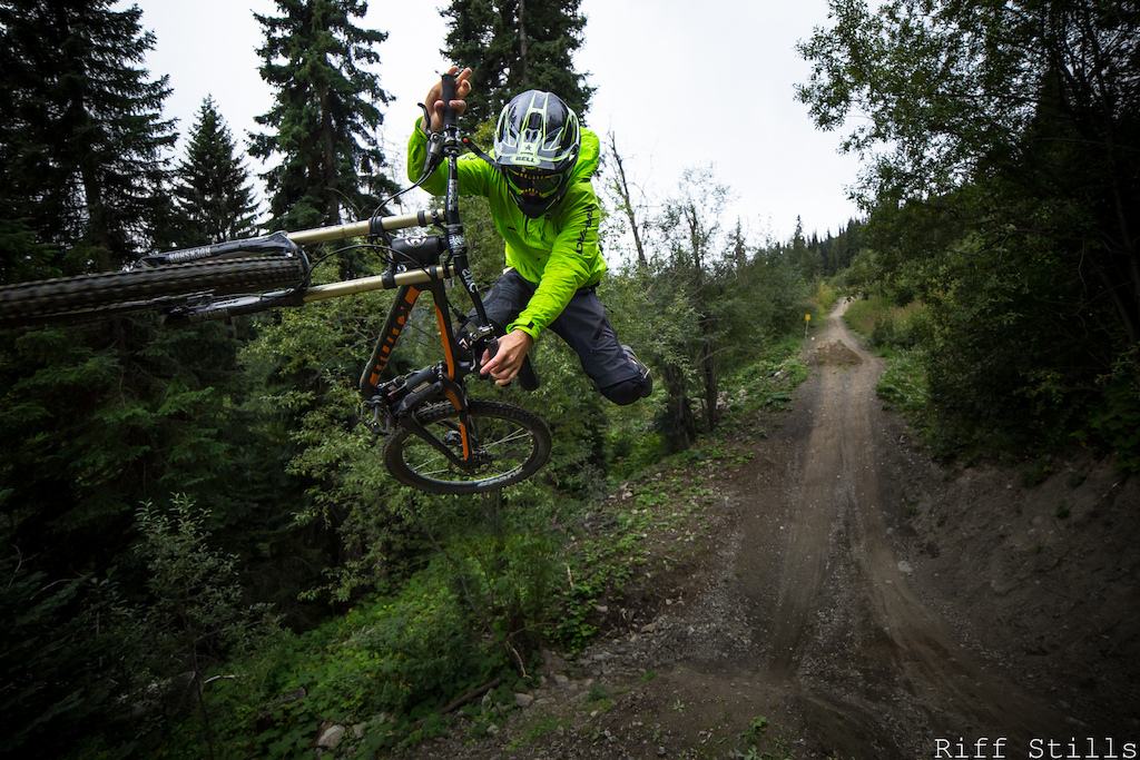 Dylan styling out this air on "steam shovel" Sun Peaks raddest dirt jump trail. I shot this with my 14mm 2.8 fisheye standing on top of the landing. The rider to camera distance was very small, I usually always know were Dylan is going to be, so I have no problem putting myself and my gear in the line of fire when we capture nugs like this!