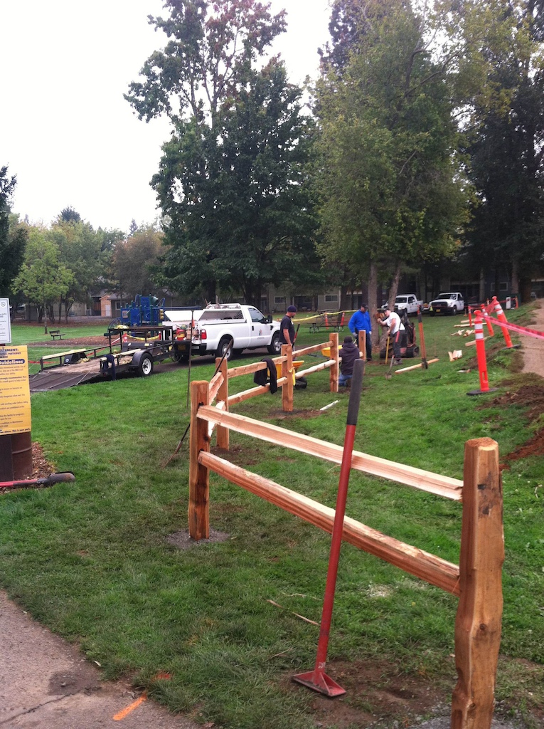 Thanks to a grant from REI to the NWTA, a fence was put up to define the bike area at Eichler. THPRD busy installing it.