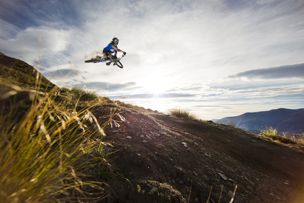 Kelly McGarry floats a section on the Rude Rock trail, Coronet Peak, Queenstown, New Zealand.