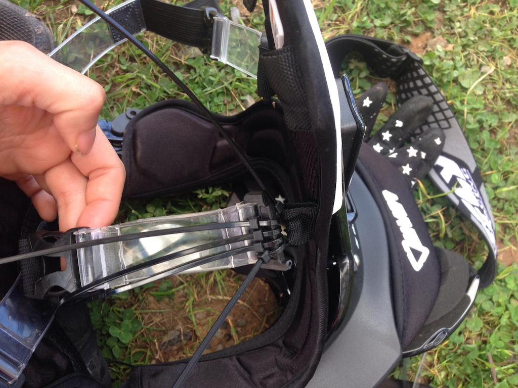 First day ever wearing a neck brace and I cracked the plastic piece that holds the shoulder strap on when I crashed. Impromptu repair followed.