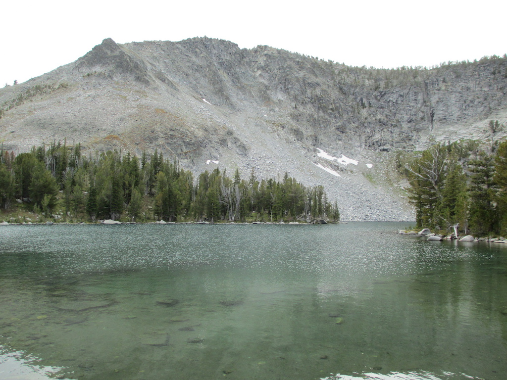 Upper Slag A Melt Lake along the trail. Continental Divide in background.