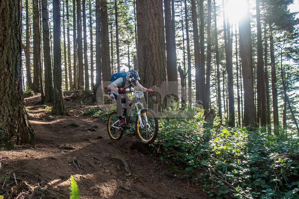 Hucking a root drop at Mach 5 during the Cascadia Dirt Cup.
