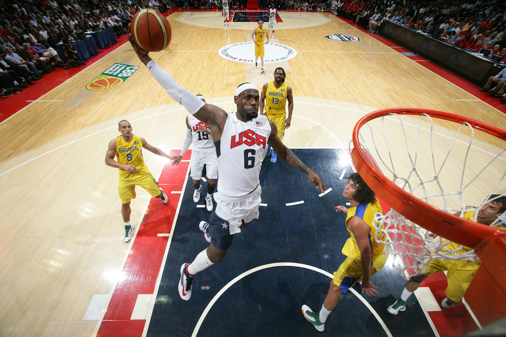 WASHINGTON, DC - JULY 16:  LeBron James #6 of the USA Men's Senior National Team dunks against Brazil at the Verizon Center on July 16, 2012 in Washington, DC. NOTE TO USER: User expressly acknowledges and agrees that, by downloading and or using this photograph, User is consenting to the terms and conditions of the Getty Images License Agreement. Mandatory Copyright Notice: Copyright 2012 NBAE (Photo by Ned Dishman/NBAE via Getty Images)