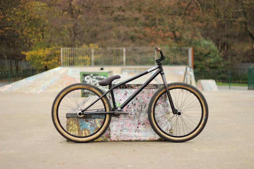 My bike. NS Capital 24 2014 frame, Identiti Rebate park fork, Sunday freeze stem, Black Market Molly Hatchet handle bars 3", Odyssey Hazardlite front rim on Eclat Tec hub, Alienation Runaway on Federal V3 free coaster, Premium cranks, gusset pedals, S&amp;M seat, season druid sprocket, DMR supermoto tan wall tyres, FSA impact headset, kmc chain, primo plastic hub guard, abikeco animal lino steel pegs, cult vans grips. photo taken at mill houses skatepark sheffield.